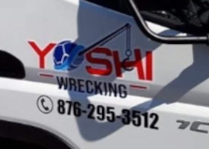 YOSHI Wrecking Service logo