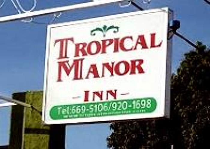 Tropical Manor Inn logo