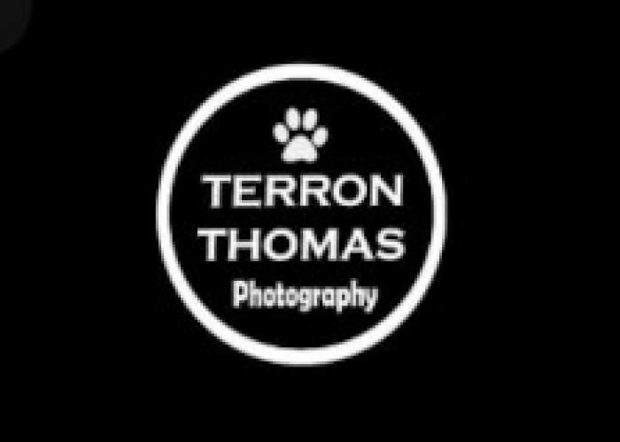 T. Thomas photography logo
